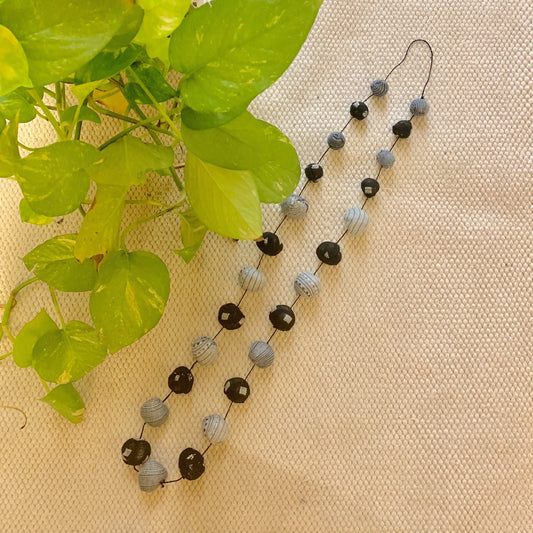 Round black-grey neck piece